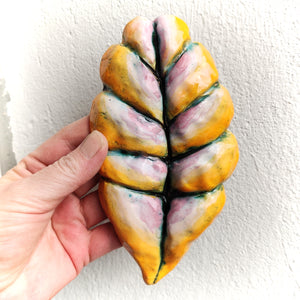 Orange leafy fruit - strange fruits